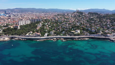 Aerial-traveling-toward-Marseille-south-district-coastal-road-sunny-day.